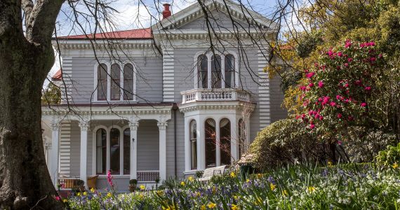 big old house with garden source image